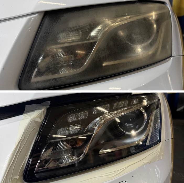 Atelier automobile professionnel avec plusieurs véhicules en cours de réparation et maintenance